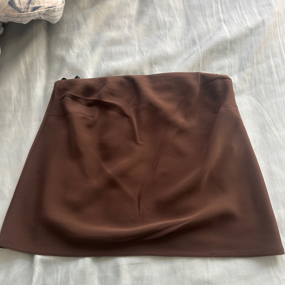 It doesn’t fit me anymore; is a tube top could potentially be worn as a skirt!